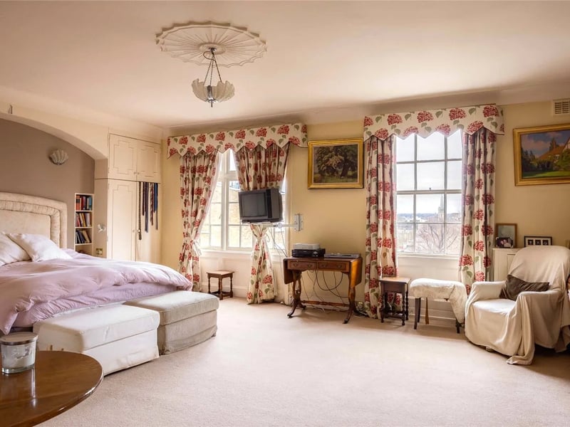 The large bedroom with sprawling windows