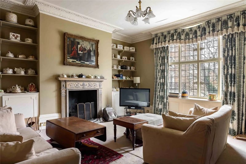 The property features 3 reception rooms