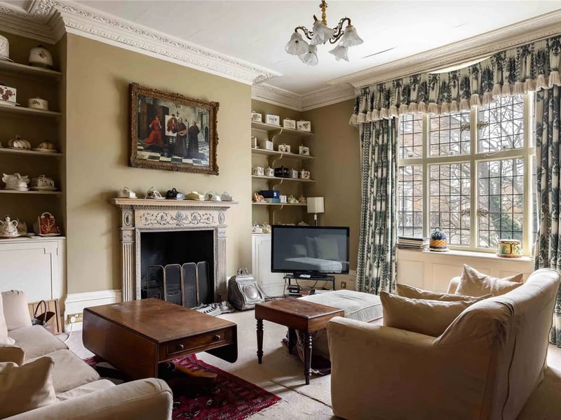 The property features 3 reception rooms