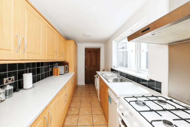 The kitchen is pictured here, with a huge worktop available 