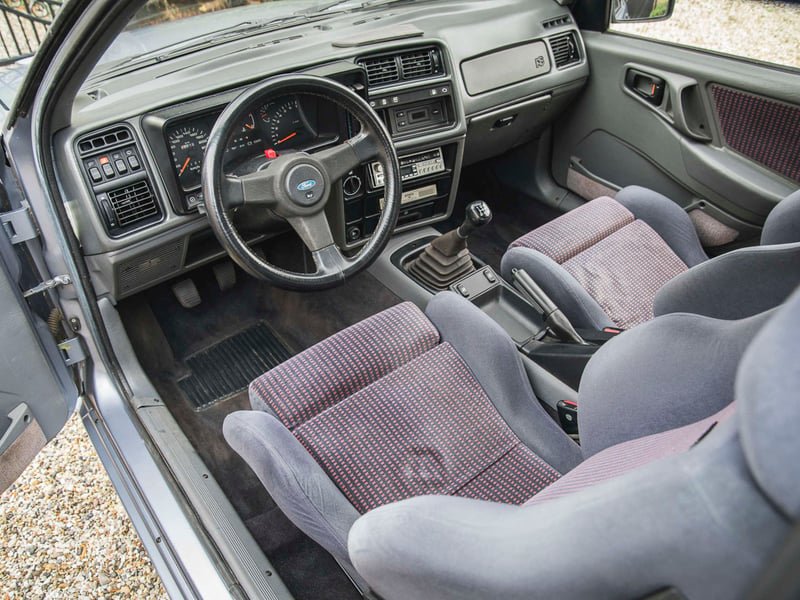 The current keeper is only the car’s second owner and this example comes with a full service history documenting its 42,000 miles. Described by Silverstone’s specialists as one of the most honest and original Sierra RS Cosworths, it’s a great example of a true blue-collar hero car.