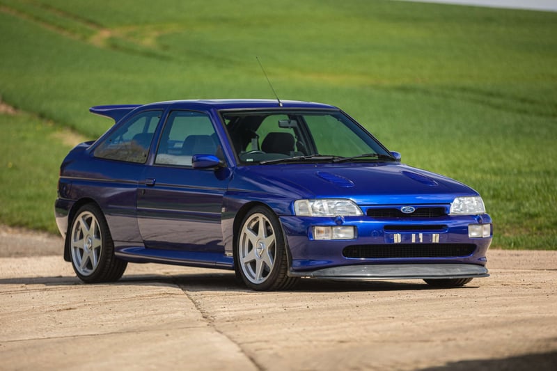 The Escort RS Cosworth was the successor to the Sierra as Ford’s rally superstar. Around 7,000 homologation models were built between 1994 and 1996, based on a cut-down Sierra chassis and with an upgraded version of its 2.0-litre turbocharged engine. This facelifted model got a smaller, less laggy turbo and upgraded exterior features including new bumpers, grille and alloys and is already legendary in the list of desirable fast Fords.