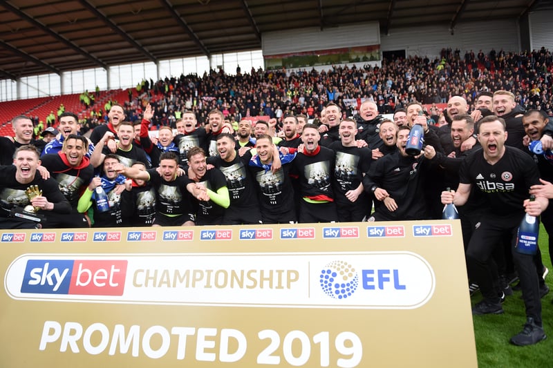 Sheffield United players celebrate their promotion after the game at Stoke City  (Photo by Nathan Stirk/Getty Images)