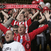 Sheffield United supporters celebrate promotion into the Premier League in May 2019 (photo Getty Images)