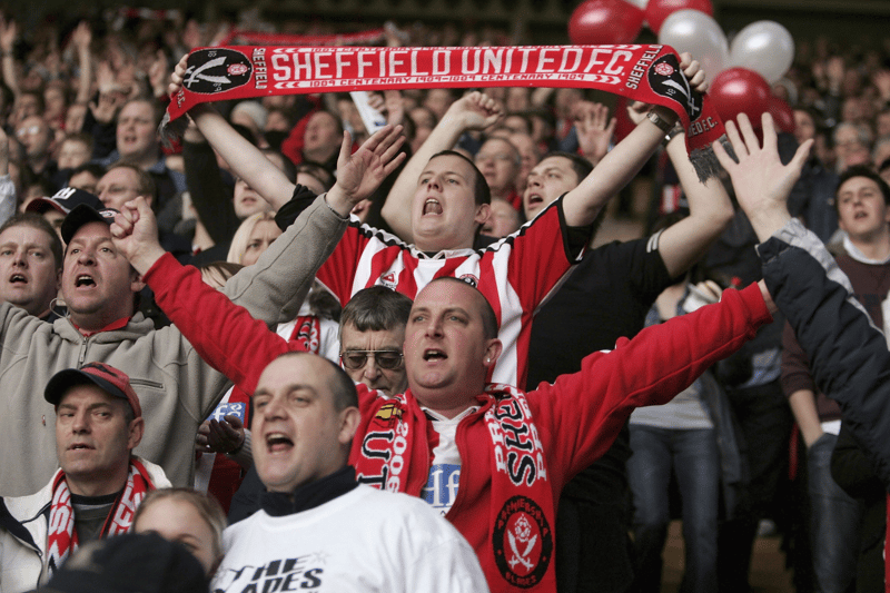 Sheffield United supporters celebrate promotion into the Premier League in May 2019 (photo Getty Images)
