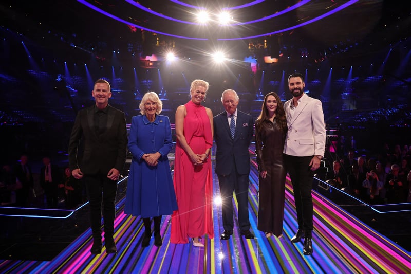 Charles III and Camilla, Queen Consort pose with the presenters of this year’s Eurovision Song Contest, Scott Mills, Hannah Waddingham, Julia Sanina and Rylan Clark at M&S Bank Arena.