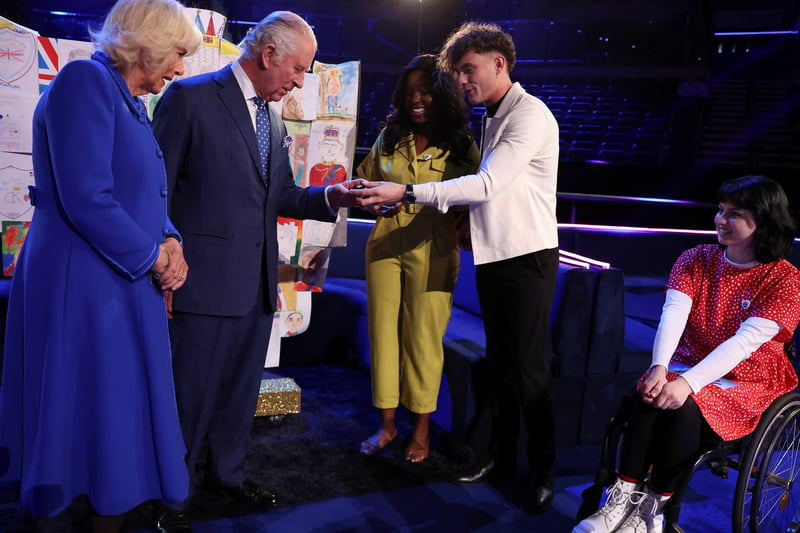 The royal pair receive Blue Peter badges.