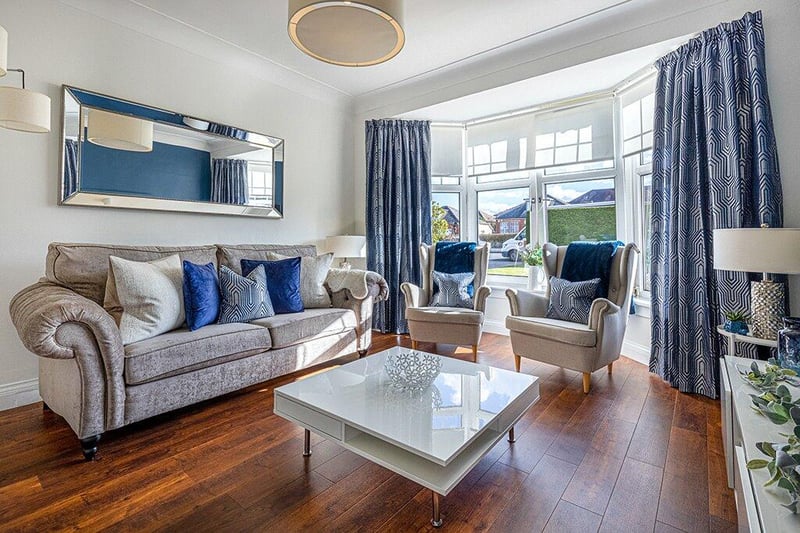 The bay windowed sitting room offers great views of the garden and is a great place to relax. 
