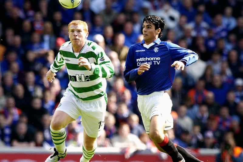 Current Arsenal boss Mikel Arteta and former Celtic manager Neil Lennon battle for the ball in midfield. 