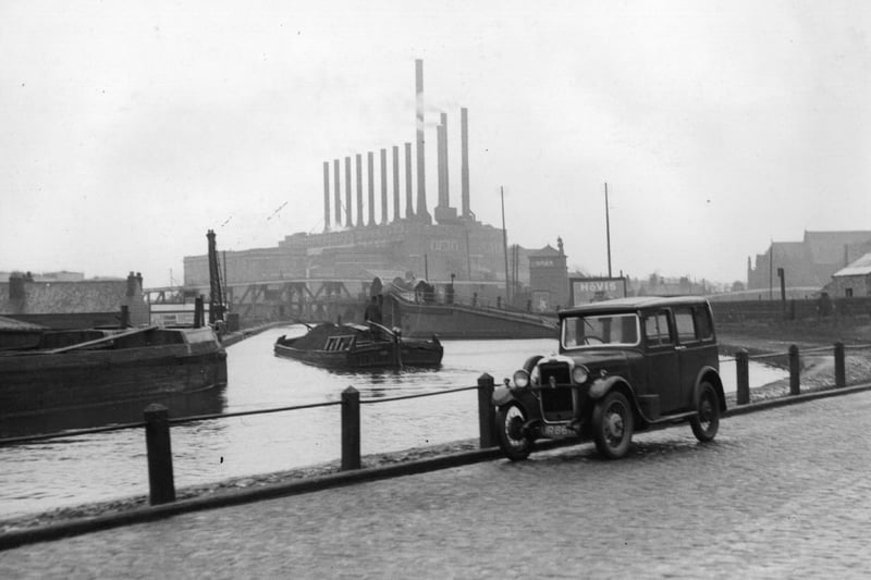 View of Bridgewater canal in Manchester with the factory chimneys in the background.  Credit: Getty