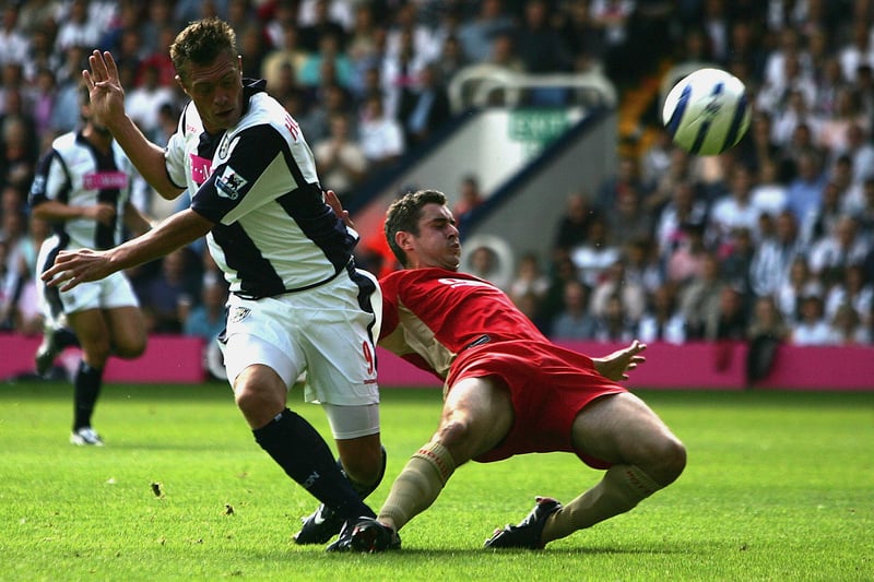 Geoff Horsfield beats the tackle of Dejan Stefonavic as the Baggies begin to take control of the contest