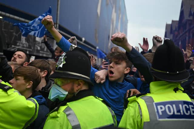 Everton fans greet the team coach at Goodison Park before the clash against Newcastle United.