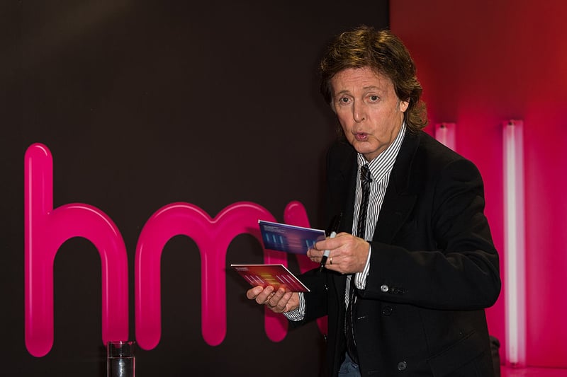 Paul McCartney with his album New in 2013.  (Photo by Ian Gavan/Getty Images)