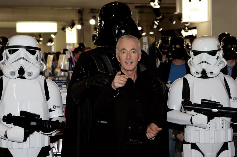 C-3PO actor Anthony Daniels posed with Star Wars characters in 2005  (Photo by Gareth Cattermole/Getty Images)