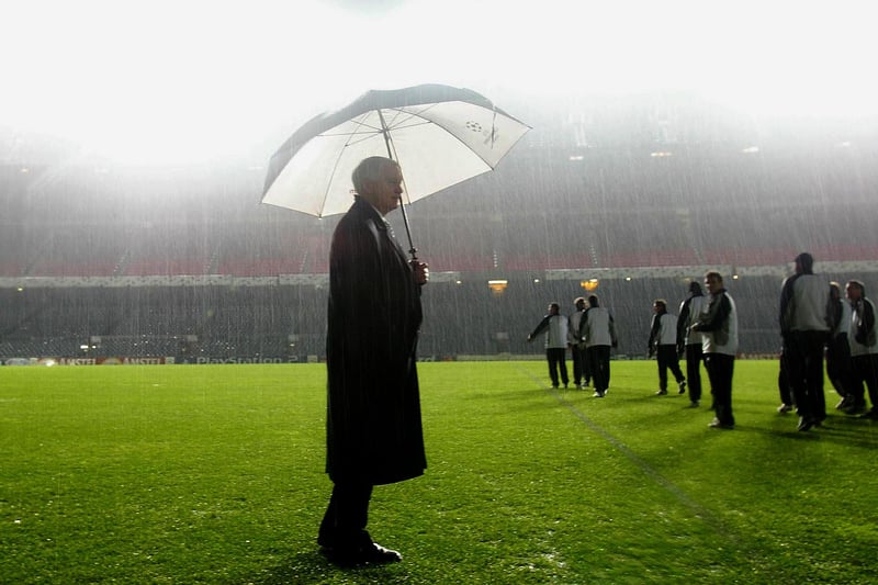 Newcastle manager Sir Bobby Robson looks on during the pitch inspection before the game is postponed during the match between Barcelona and Newcastle United in the UEFA Champions League, Second Phase, Group A match at the Nou Camp in Barcelona, Spain on December 10, 2002. Robson has been sacked by Newcastle August 30, 2004 following a poor start to the new season. (Photo By Laurence Griffiths/Getty Images)