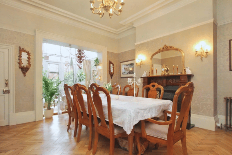 An elegant dining area capable of seating many