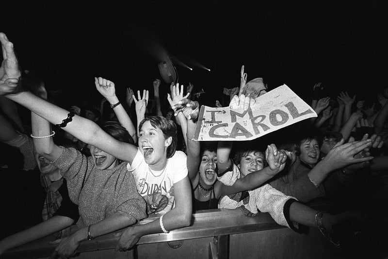 Fans of the band in the front row during a concert held at Wembley Arena in London, England on December 19, 1983. (Photo by Rogers/Express/Getty Images)