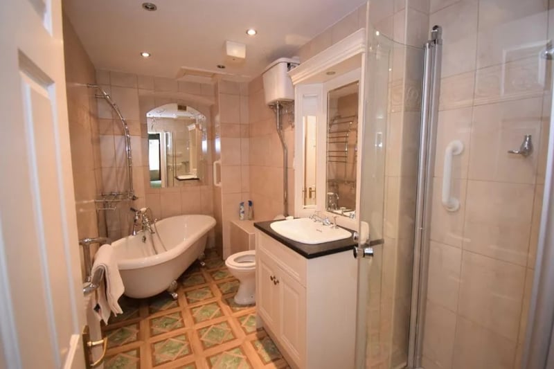 The main bathroom comes with a four piece set including a separate bath and shower