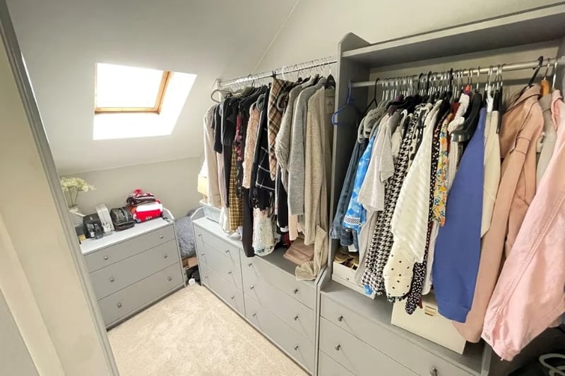 The maisonette inside the property features a large cloakroom area