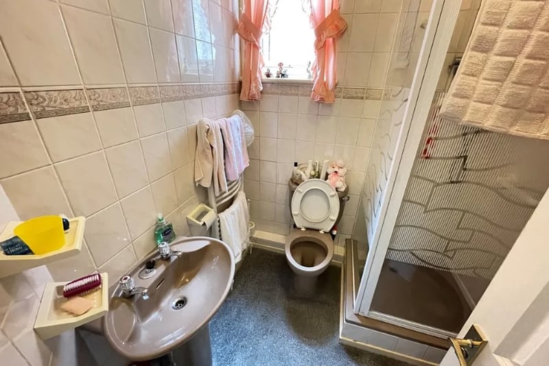 A small bathroom inside the additional flat comes complete with its own shower