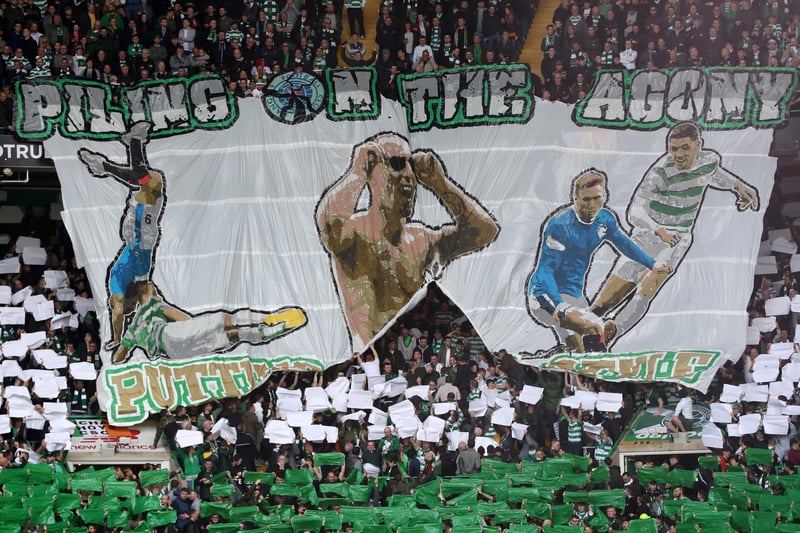 Celtic fans group, The Green Brigade unveiled a large-scale tifo prior to kick-off which read ‘Piling on the agony’ in reference to their rivals.