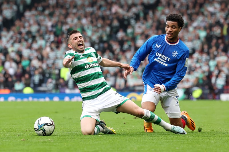 Malik Tillman of Rangers concedes a free-kick after wiping out Greg Taylor of Celtic.