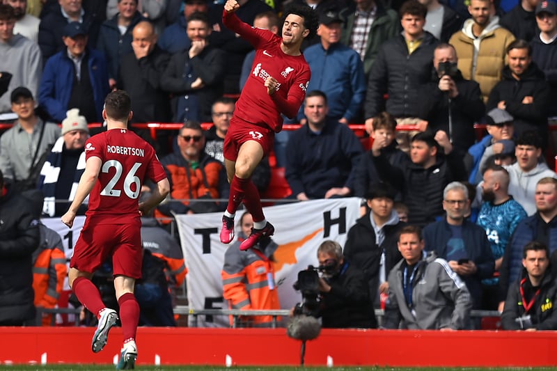 Curtis Jones celebrates in front of the Tottenham fans after scoring Liverpool’s first goal after just three minutes. 