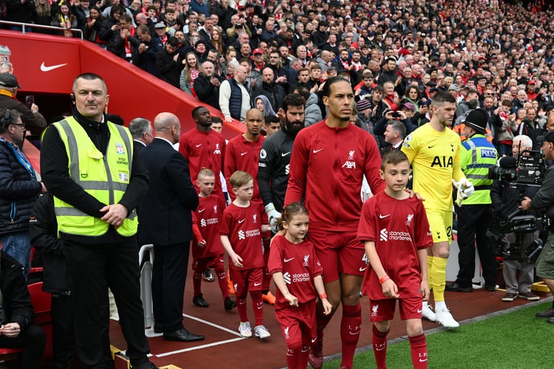 Virgil van Dijk leads Liverpool out as the fans cheer ahead of the Premier League match between against Tottenham Hotspur at Anfield. 
