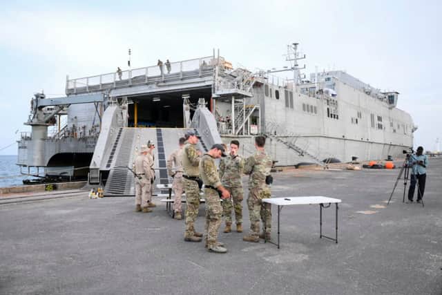 US military prepare for Americans to board a boat to leave Sudan. Credit: Getty
