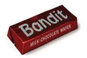 The Bandit biscuit was a chocolate covered wafer also produced by the Hillington bakers, Macdonald & Sons, similar in essence to a Penguin - they were much different in style. These biscuits were for the bad boys, the Dennis the Menace type characters.