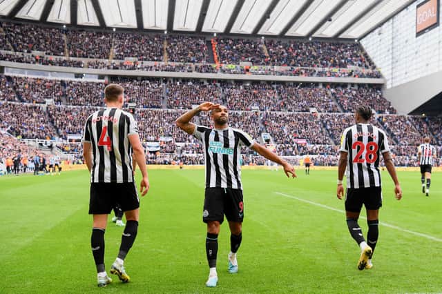 Callum Wilson of Newcastle United (C) celebrates after scoring the team's first goal during the Premier League match between Newcastle United and Southampton FC at St. James Park on April 30, 2023 in Newcastle upon Tyne, England. (Photo by Stu Forster/Getty Images)