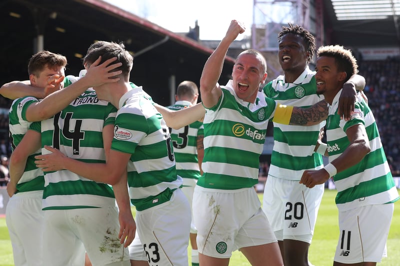 The Celtic players celebrate with Stuart Armstrong after going 0-3 up. 