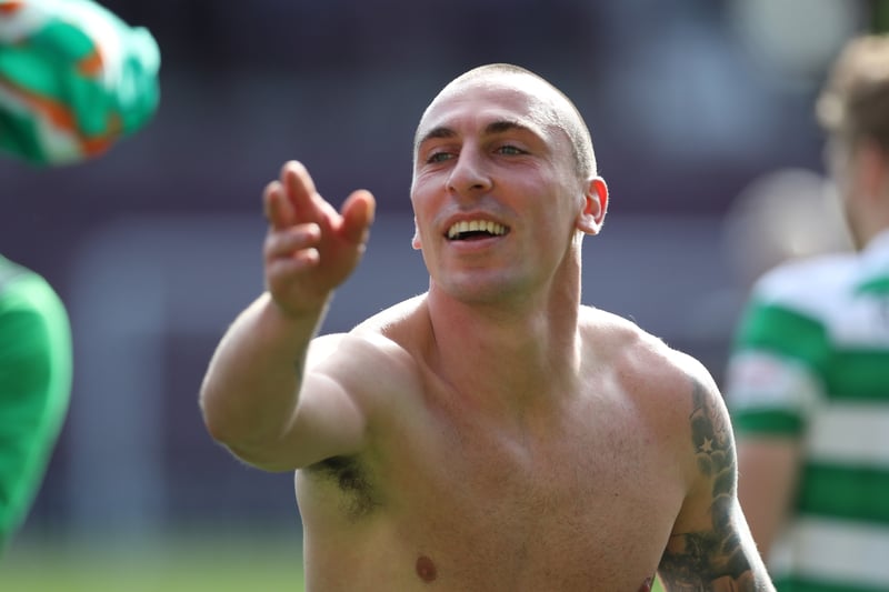 Celtic captain Scott Brown enjoys the post match celebrations at Tynecastle. He’ll once again get his hands on the league trophy in a few weeks. 