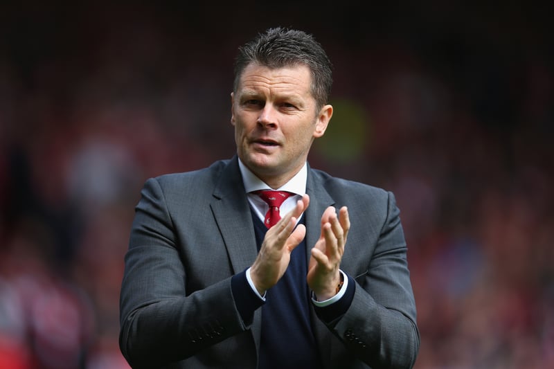 Steve Cotterill enters the dugout and applauds the fans for the final game of the season.