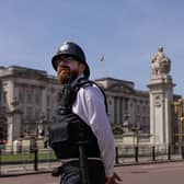 A Met Police officer outside Buckingham Palace, ahead of the Coronation. (Photo by Dan Kitwood/Getty Images)