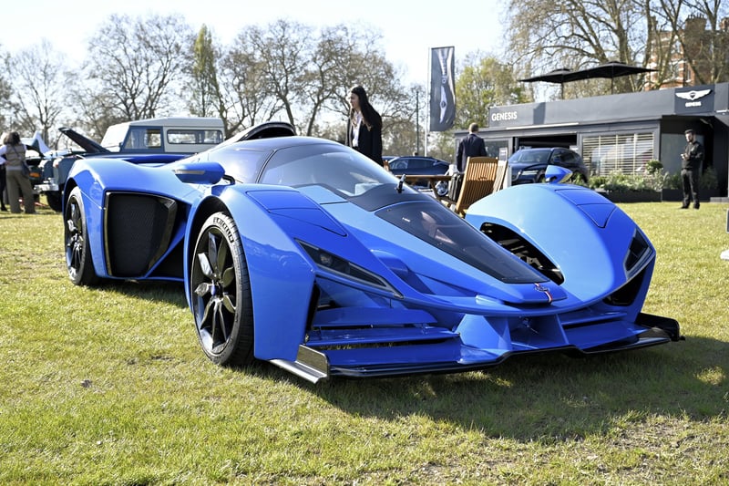 Think hybrids are boring? Think again. This is the Delage D12 hybrid hypercar. The company says the wildly styled two-seater, which boasts a low, long, fighter jet-inspired body, offers a "Formula 1 driving experience for the road". Combining an electric motor and a naturally aspirated 7.6-litre V12 engine, the D12 offers 1085bhp in GT guise and 794lb/ft or 996bhp and 652lb/ft in D12 Club specification. Drive is sent to the rear wheels only by an eight-speed automatic gearbox. Delage claims a 0-62mph time of 2.6 seconds for the D12 GT and 2.9 seconds for the D12 Club, with a top speed of 244mph.
