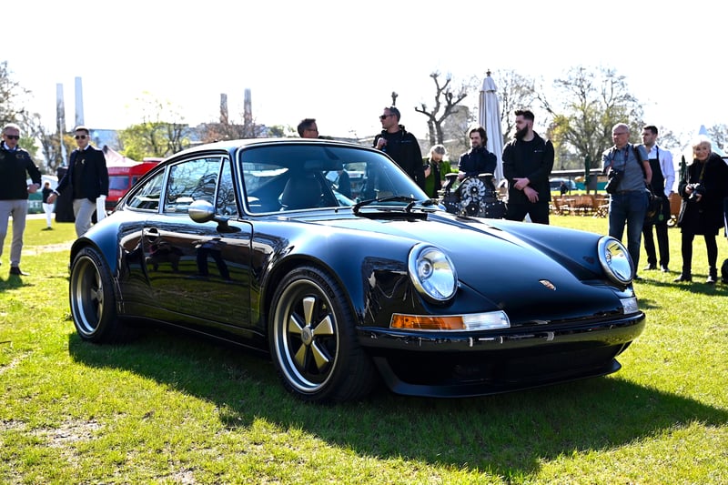 Oxfordshire-based Theon Design, specialist in bespoke Porsche-based commissions, displayed its latest creation, ITA001, for the first time ahead of being shipped to Italy. Boasting a lightweight carbon body, the bespoke 911 (964) is fitted with a 400bhp 4.0-litre air-cooled flat-six engine and six-speed manual gearbox. Visually stealthy, but with modern features blended in throughout, Theon Design believes it delivers “the ultimate air-cooled Porsche 911 experience”.