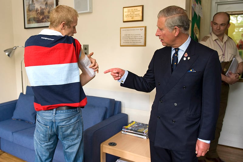 King Charles, Then the Prince of Wales  meets Lance  Cpl James Taylor from King’s Lynne, who served in the The Royal Engineers and was wounded in Afghanistan,  at The Royal Centre for Defence Medicine where Taylor is being treated, at Selly Oak Hospital, June 19, 2009 in Birmingham, England. (Photo by Arthur Edwards/WPA Pool/Getty Images)
