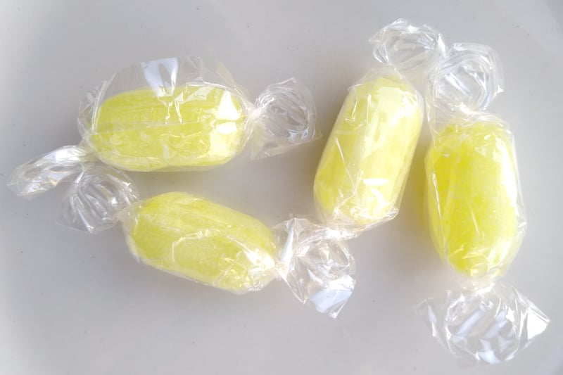 Sherbet Lemons were a tangy and zesty sweet that had a fizzy sherbet centre. They were often sold in small paper bags and were a popular choice for those who enjoyed a sour taste.