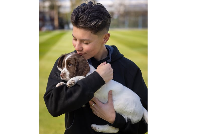  Issy, the pup poses with cricketer Issy Wong, who plays for Warwickshire, Central Sparks, Birmingham Phoenix, Mumbai Indians and England as a fast-medium bowler.  (Photo - Warwickshire CCC)