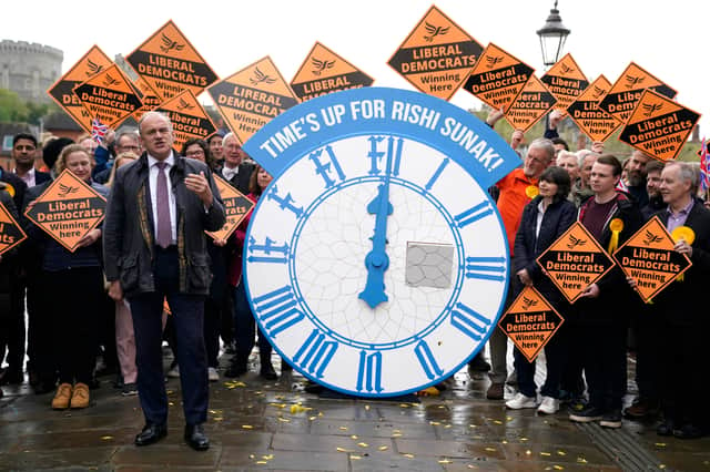 Sir Ed Davey unveils a "general election countdown clock". Credit: PA