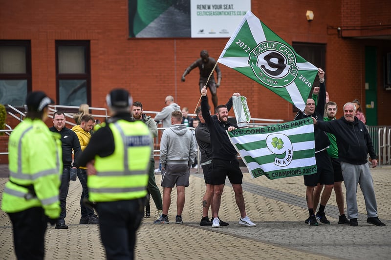 Celtic fans gather at Celtic Park following the announcement that their club has been crowned Scottish champions for the ninth season in a row. 