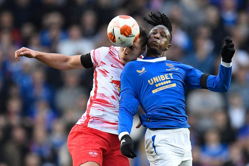 Hungarian defender Willi Orban vies for a high ball with Rangers’ attacker Joe Aribo. 