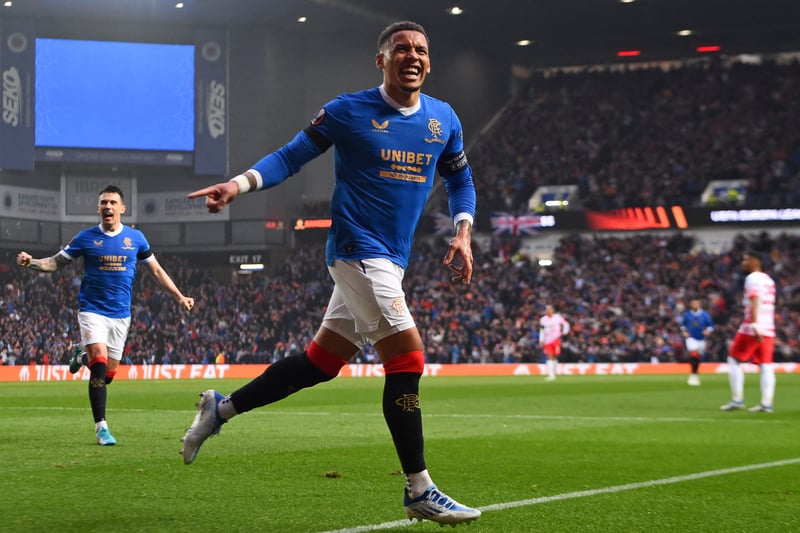 Tavernier and Ryan Jack (left) celebrate in front of the packed stands at Ibrox.