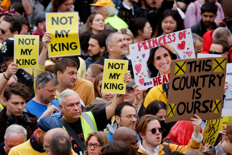 While the majority of the crowd were out to celebrate the event, protests took place in Trafalgar Square against the monarchy, with some anti-monarchy protesters arrested ahead of the ceremony. (Credit: PA)