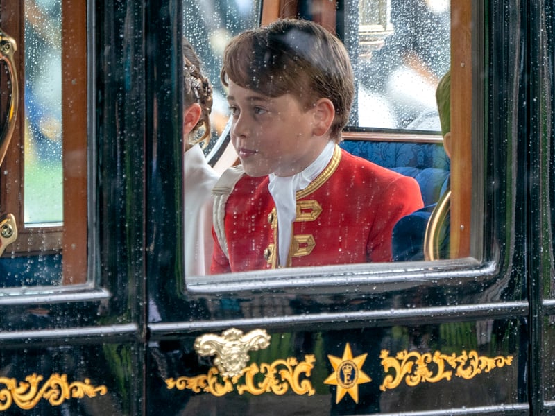 Prince George in a royal carriage