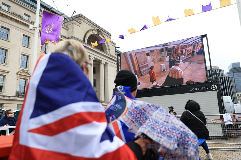 Crowds of royal fans across the country watched the ceremony on big screens, which were erected around the country. (Credit: Getty Images)