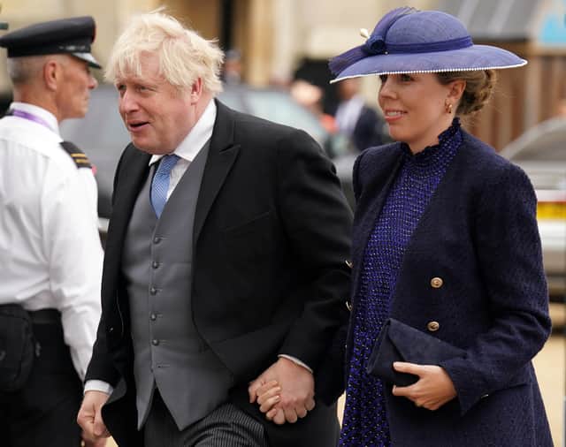 Boris Johnson and wife Carrie arrive at Westminster Abbey. Credit: PA