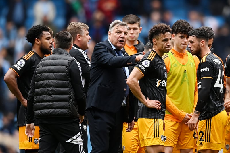 Allardyce speaks to his players after the game, with goal scorer Rodrigo looking disappointed. 