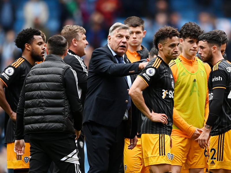 Allardyce speaks to his players after the game, with goal scorer Rodrigo looking disappointed. 
